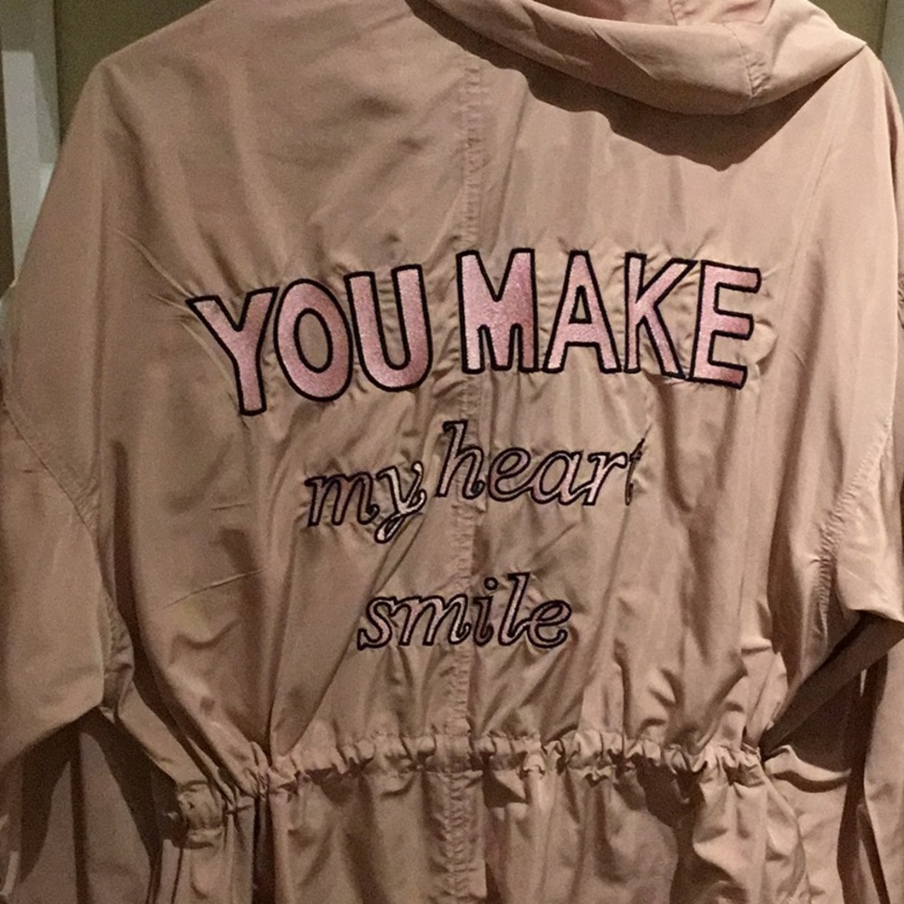 Thin Cream Colored Raincoat